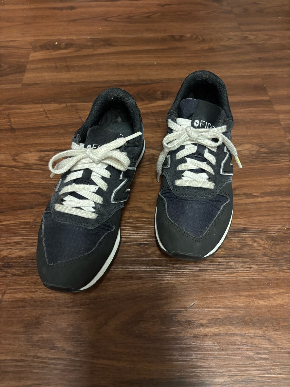 FIGS + New Balance Black and White Low-Top Sneakers Men’s 6, Women’s 7.5